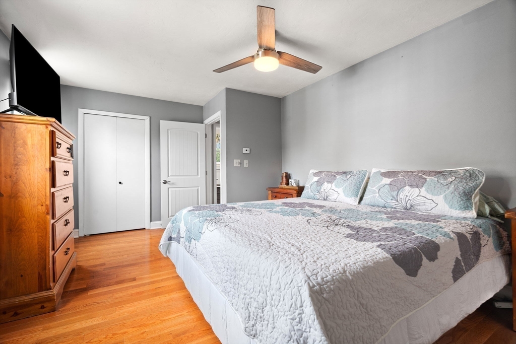 12 Dixfield Road Worcester, MA 01606 - Photo 22 of 42 a bedroom with bed and a flat screen tv