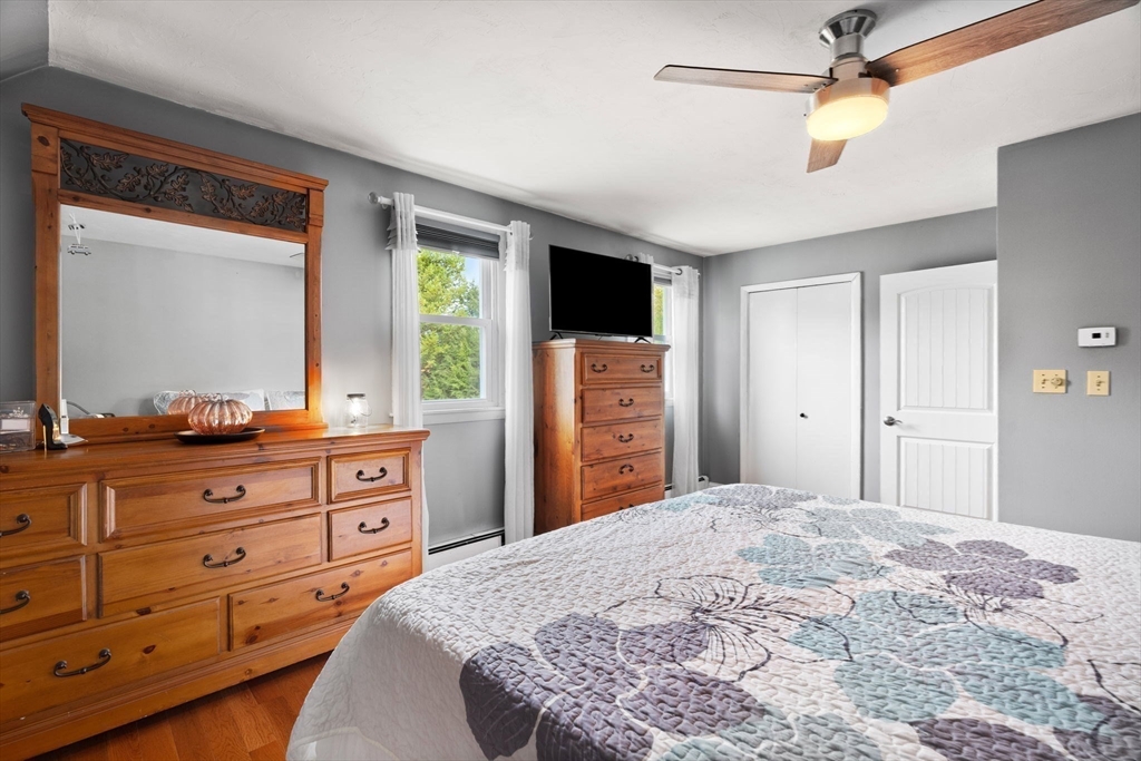 12 Dixfield Road Worcester, MA 01606 - Photo 23 of 42 a bedroom with a bed and a dresser