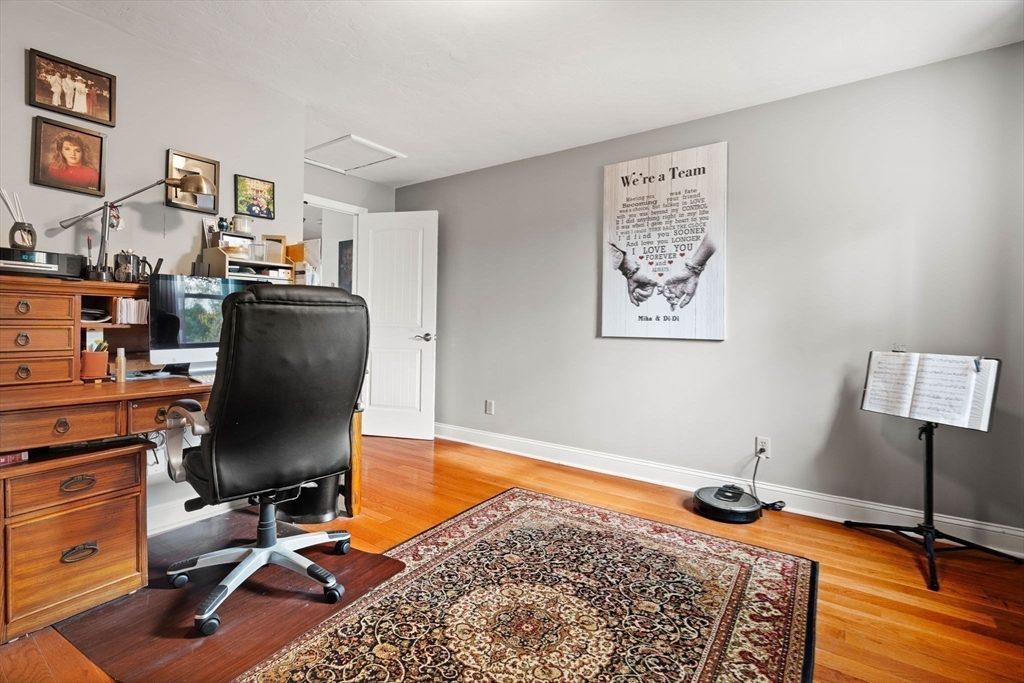 12 Dixfield Road Worcester, MA 01606 - Photo 25 of 42 a workspace with furniture and lamp