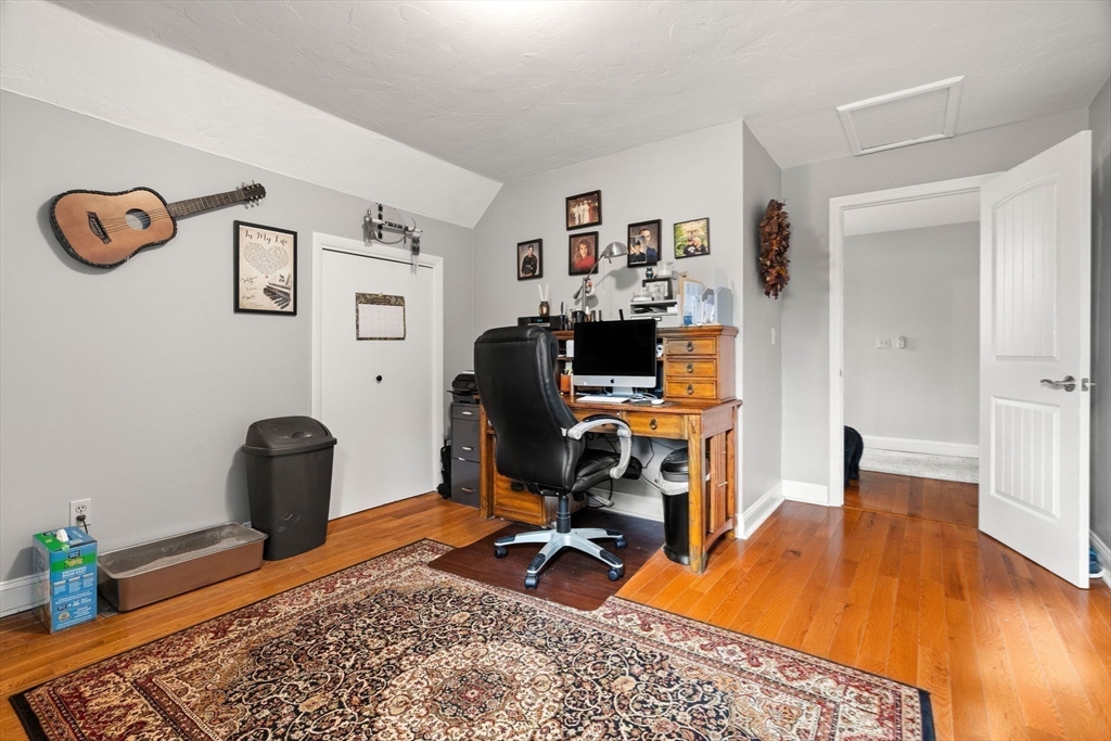 12 Dixfield Road Worcester, MA 01606 - Photo 26 of 42 a view of a workspace with furniture and wooden floor