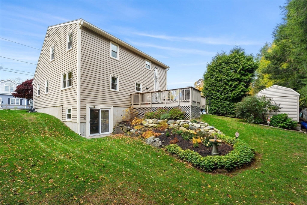 12 Dixfield Road Worcester, MA 01606 - Photo 33 of 42 a view of a house with a backyard and garden