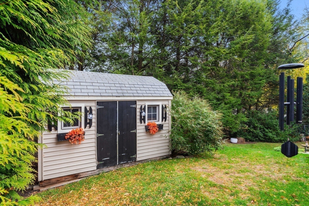 12 Dixfield Road Worcester, MA 01606 - Photo 36 of 42 a view of a house with a backyard