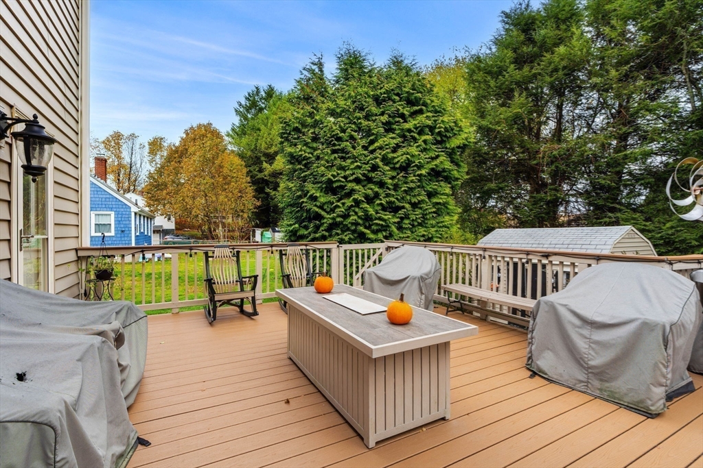 12 Dixfield Road Worcester, MA 01606 - Photo 38 of 42 a balcony with wooden floor and outdoor seating