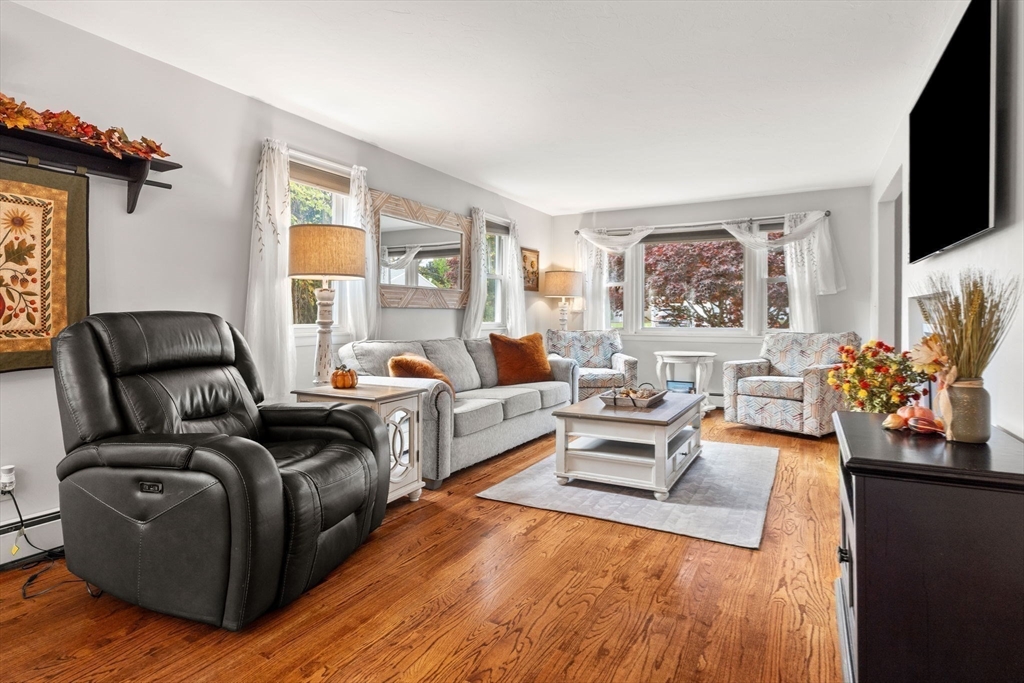 12 Dixfield Road Worcester, MA 01606 - Photo 6 of 42 a living room with furniture fireplace and flat screen tv