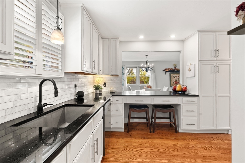 12 Dixfield Road Worcester, MA 01606 - Photo 10 of 42 a kitchen with stainless steel appliances granite countertop sink stove top oven and cabinets