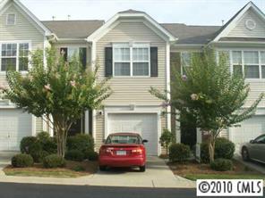 2135 Midnight Blue Lane, Unit 2135 Fort Mill, SC 29708 - Photo 1 of 7 a front view of a house with garden