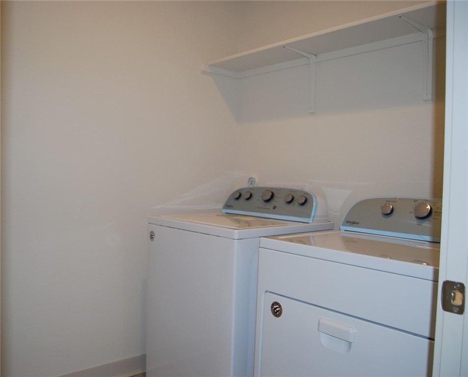 640 Peace Pipe Way Georgetown, TX 78628 - Photo 21 of 24 a utility room with dryer and washer