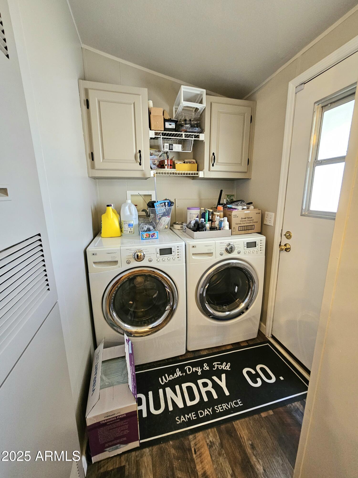 284 North Warren Road Benson, AZ 85602 - Photo 14 of 33 a utility room with sink dryer and washer