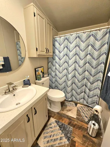 a view of hallway with wooden floor