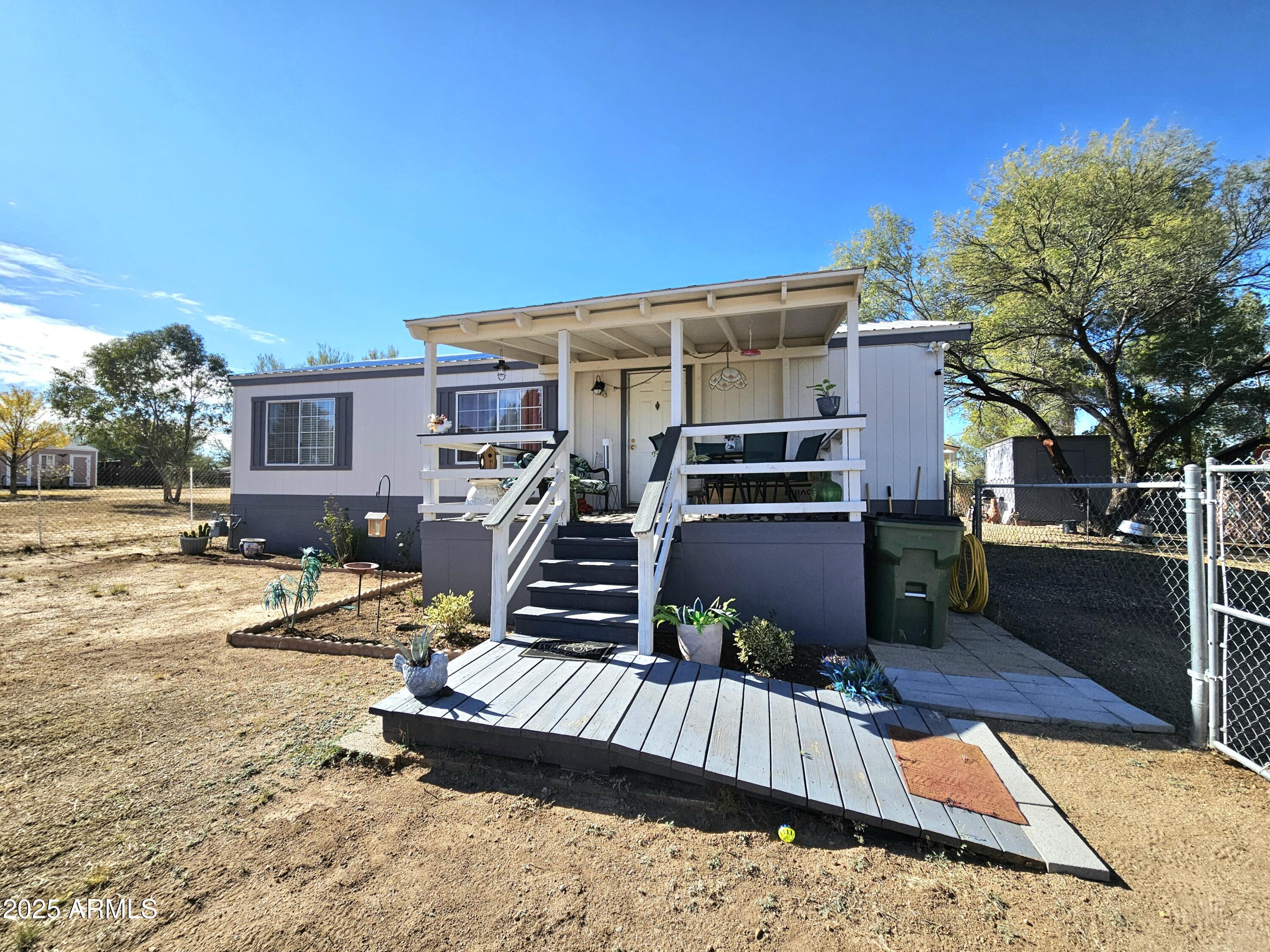 284 North Warren Road Benson, AZ 85602 - Photo 30 of 33 swimming pool view with a seating space