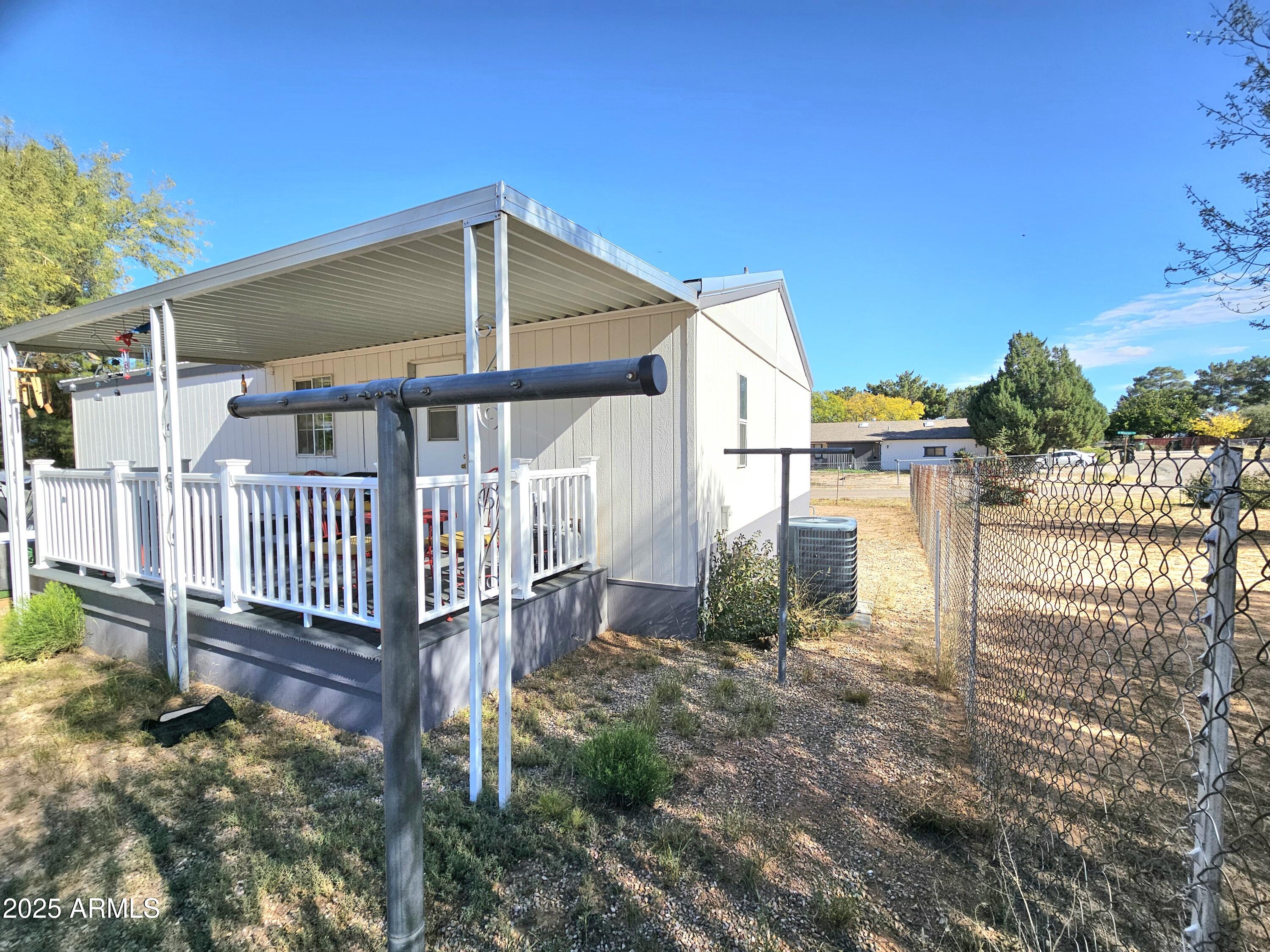 284 North Warren Road Benson, AZ 85602 - Photo 32 of 33 a view of a house with a yard
