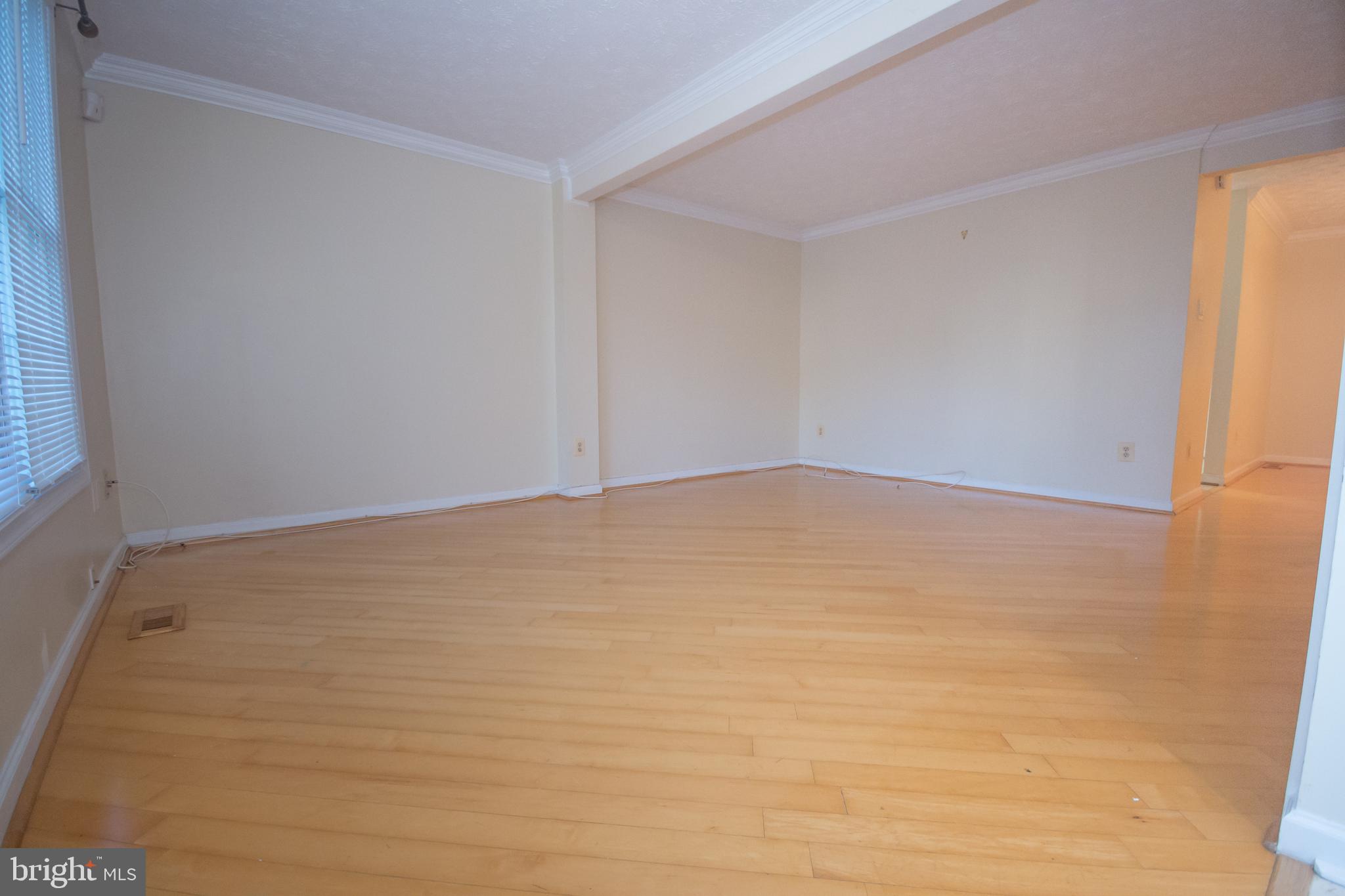 7993 Tyson Oaks Circle Vienna, VA 22182 - Photo 5 of 25 a view of an empty room
