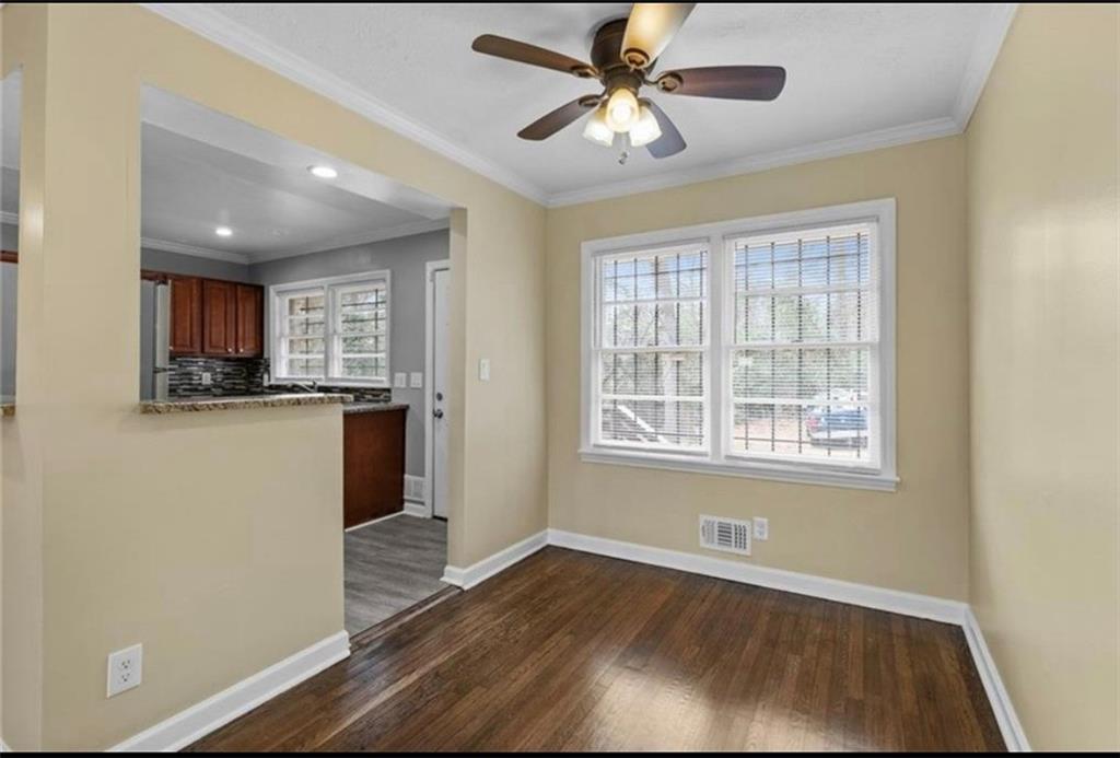 2911 Gresham Rd S East Atlanta, GA 30316 - Photo 8 of 22 a view of a kitchen from the hallway