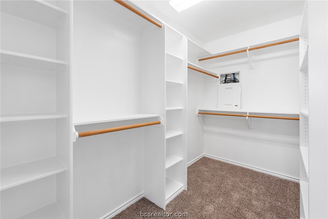 6100 Whitetail Lane Bryan, TX 77808 - Photo 21 of 37 a view of an empty walk in closet