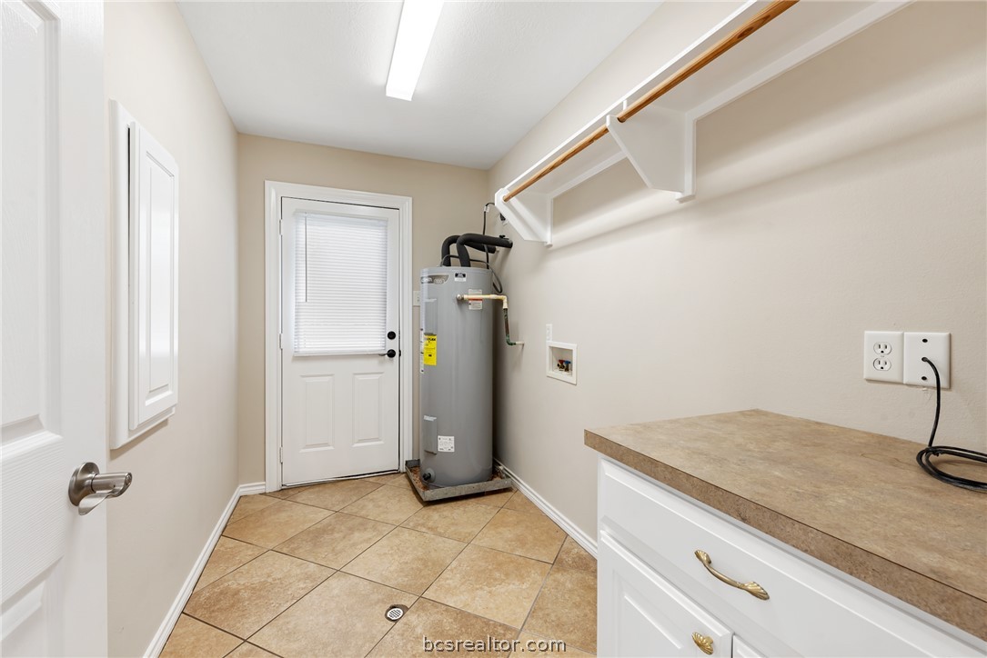 6100 Whitetail Lane Bryan, TX 77808 - Photo 27 of 37 a view of a storage & utility room