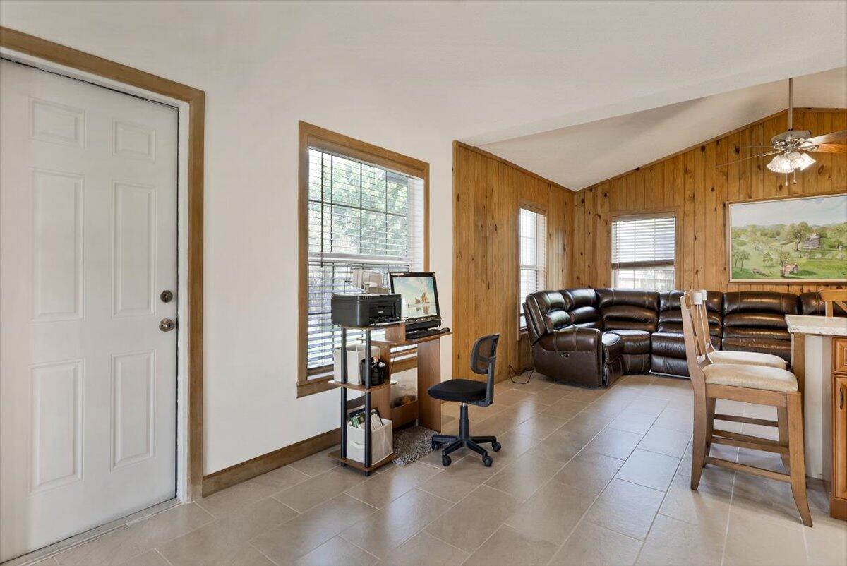 19681 Southeast County Line Road Tequesta, FL 33469 - Photo 6 of 45 a view of a livingroom with furniture and a window