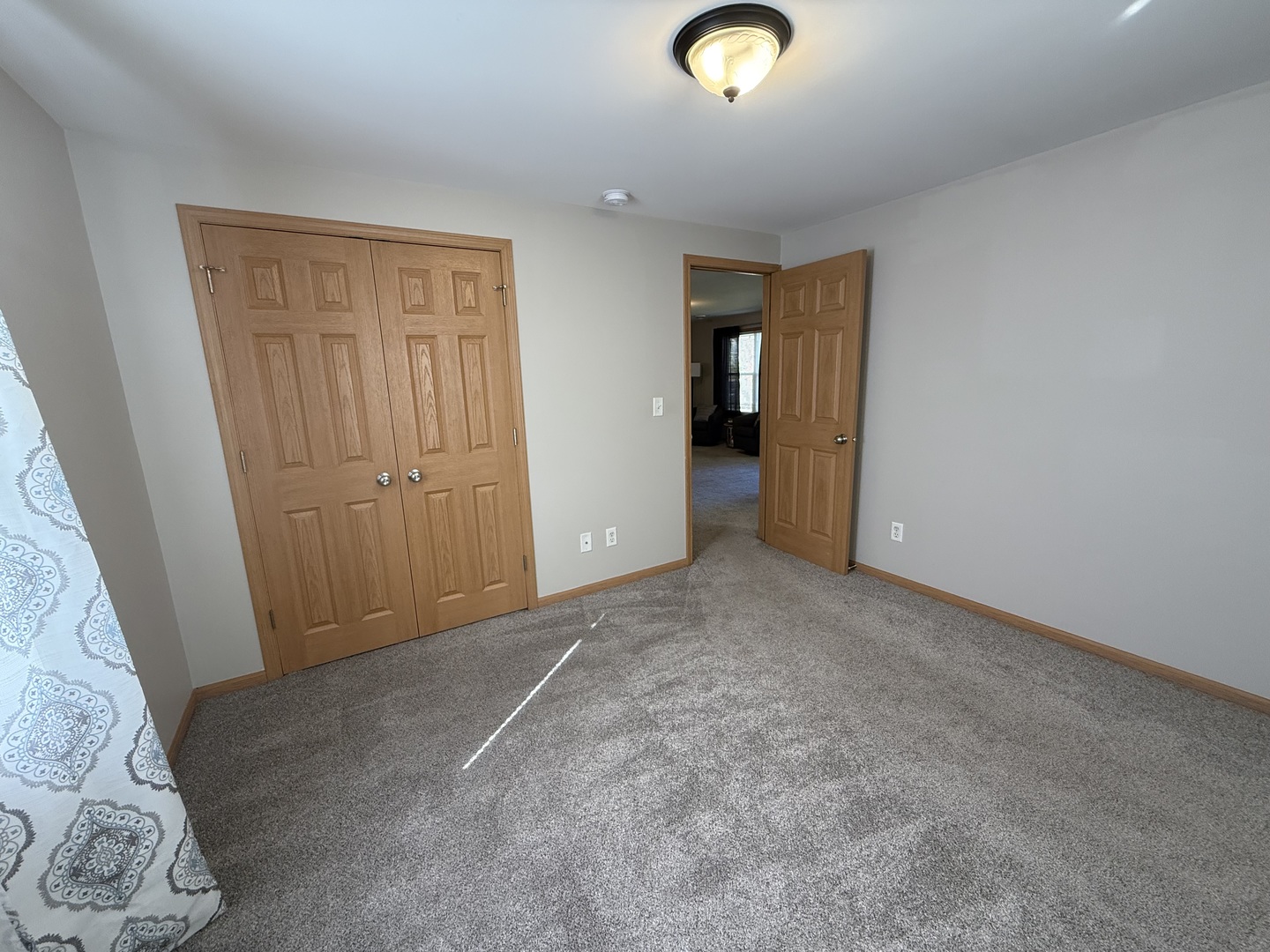 126 East Kerr Street Sycamore, IL 60178 - Photo 13 of 20 an empty room with windows