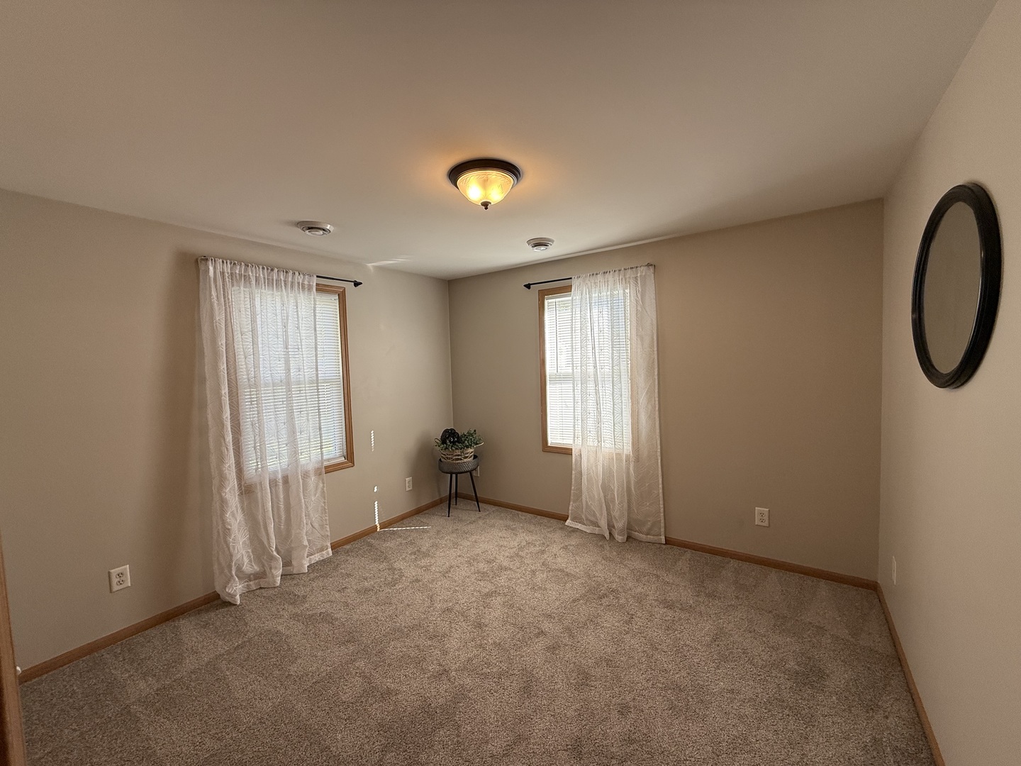 126 East Kerr Street Sycamore, IL 60178 - Photo 15 of 20 a view of an empty room with a window