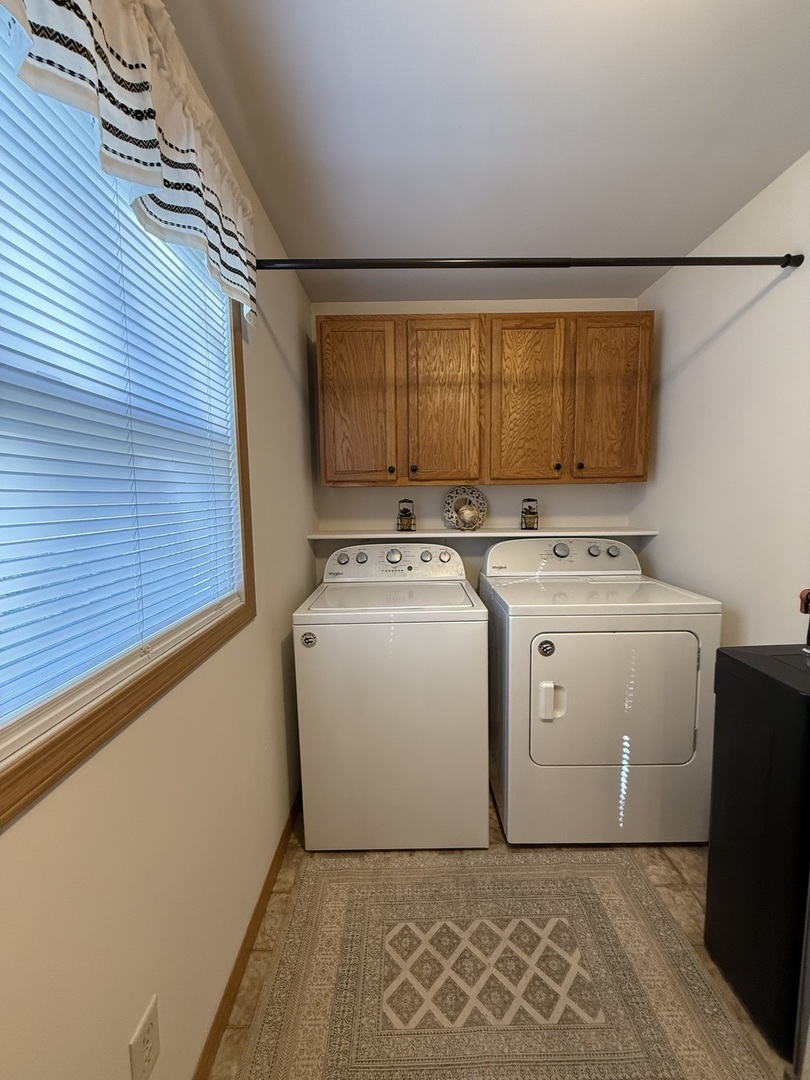 126 East Kerr Street Sycamore, IL 60178 - Photo 7 of 20 a utility room with dryer and washer