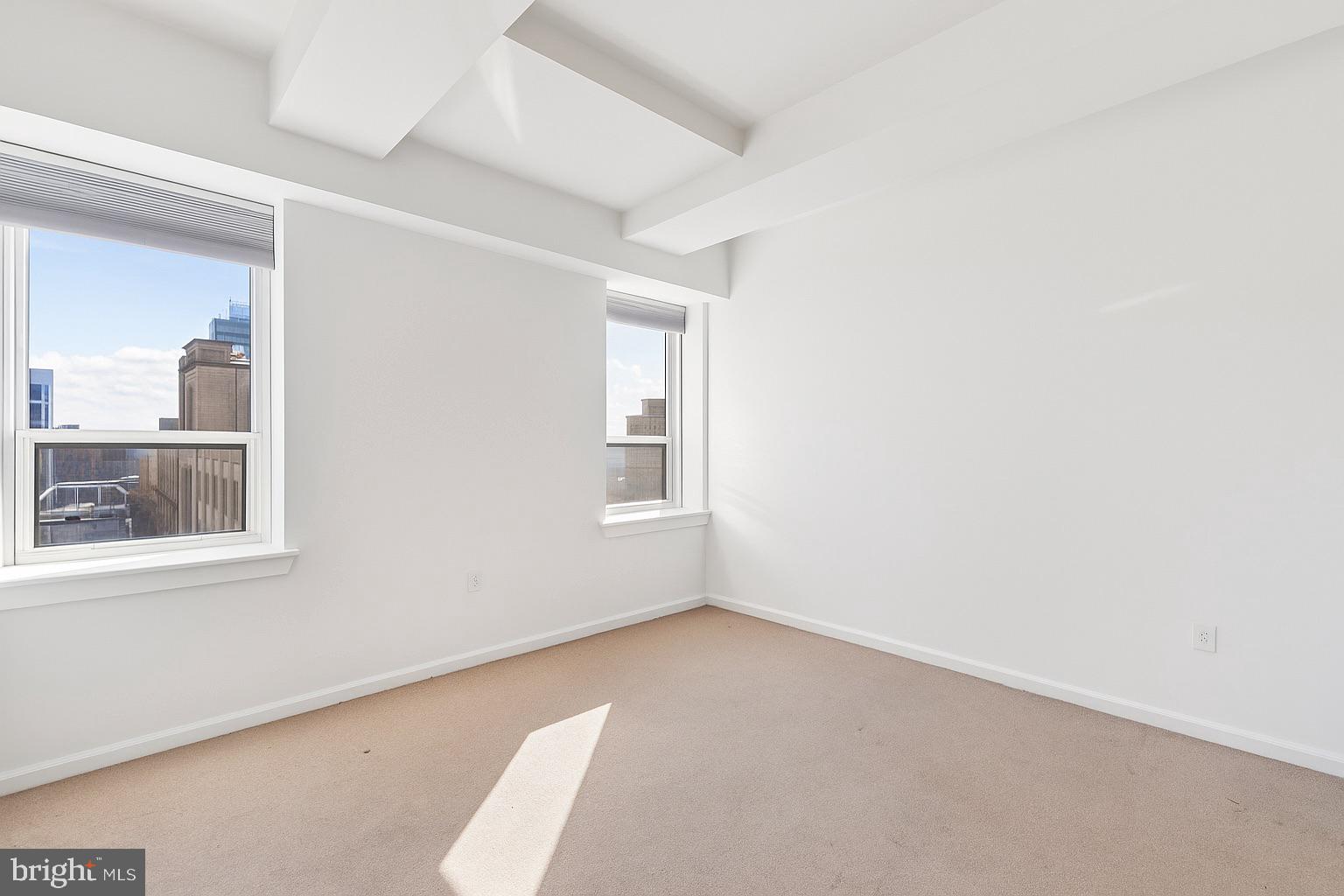 1425 Locust Street, Unit 21A Philadelphia, PA 19102 - Photo 5 of 8 an empty room with a window