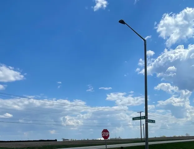 a view of a field with clear sky
