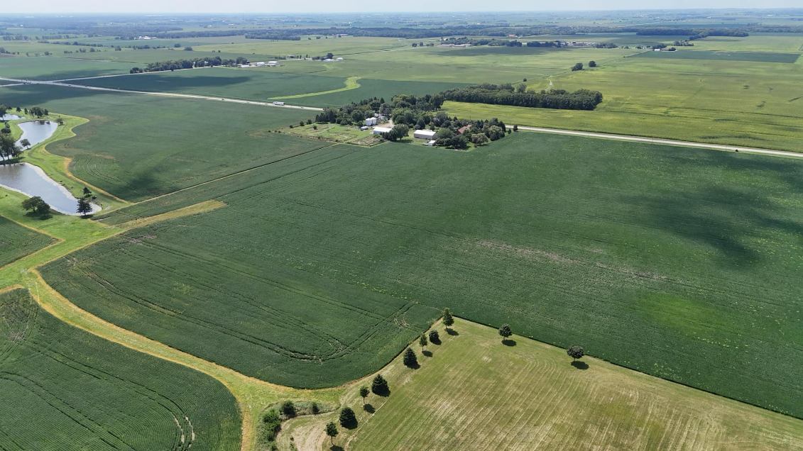 Lot 1-minooka Ridge & Jones Road Minooka, IL 60447 - Photo 6 of 6 a view of a lake with a yard