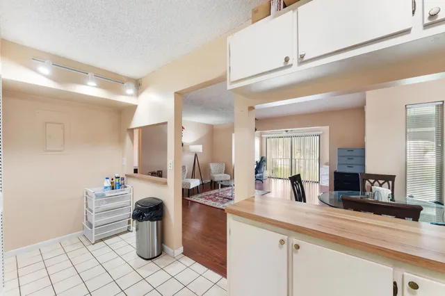 a kitchen with a sink and a counter top space