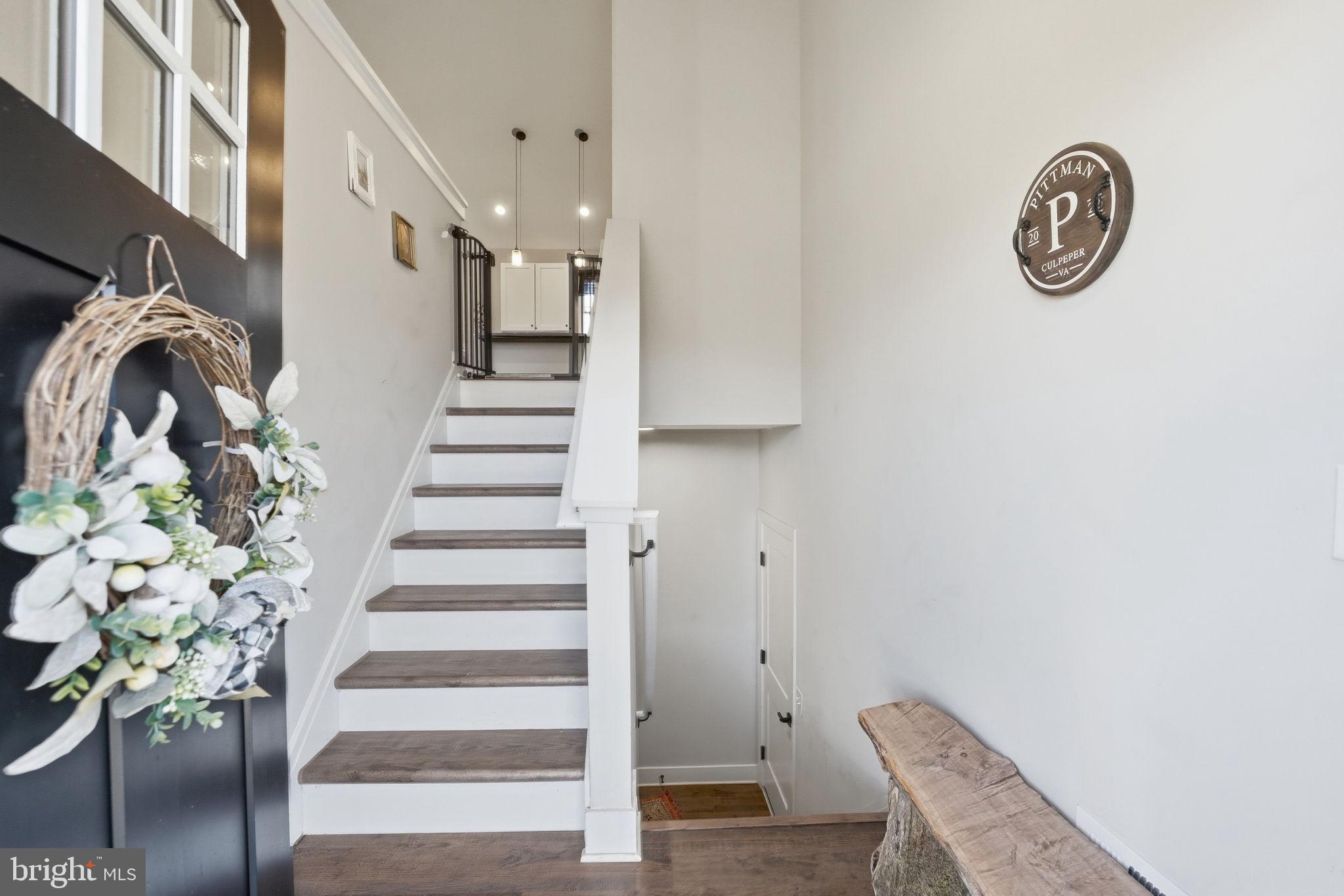 11183 Drogheda Mountain Road Culpeper, VA 22701 - Photo 4 of 60 a view of entryway with stairs and wooden floor