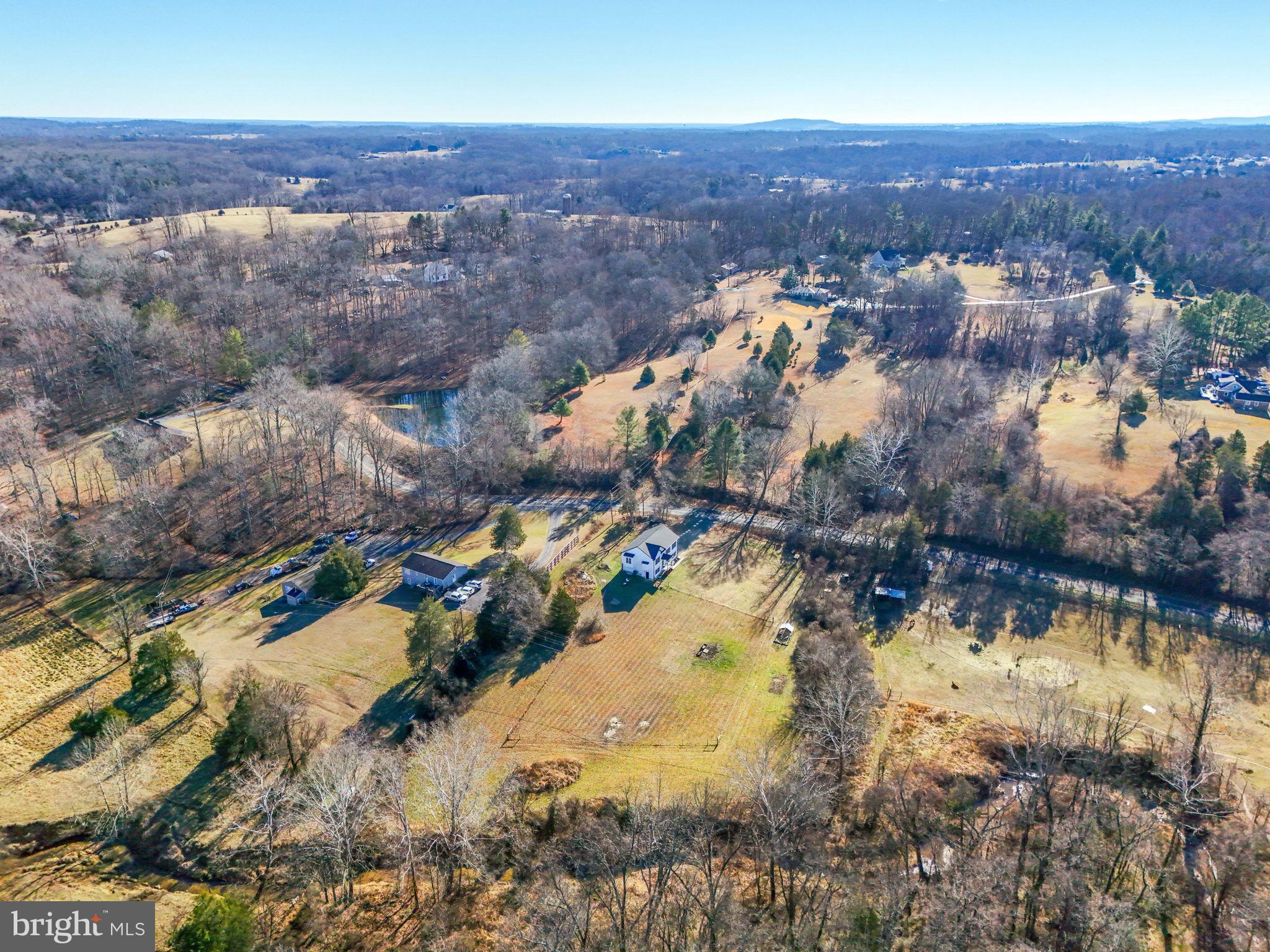 11183 Drogheda Mountain Road Culpeper, VA 22701 - Photo 41 of 60 an aerial view of residential houses with outdoor space