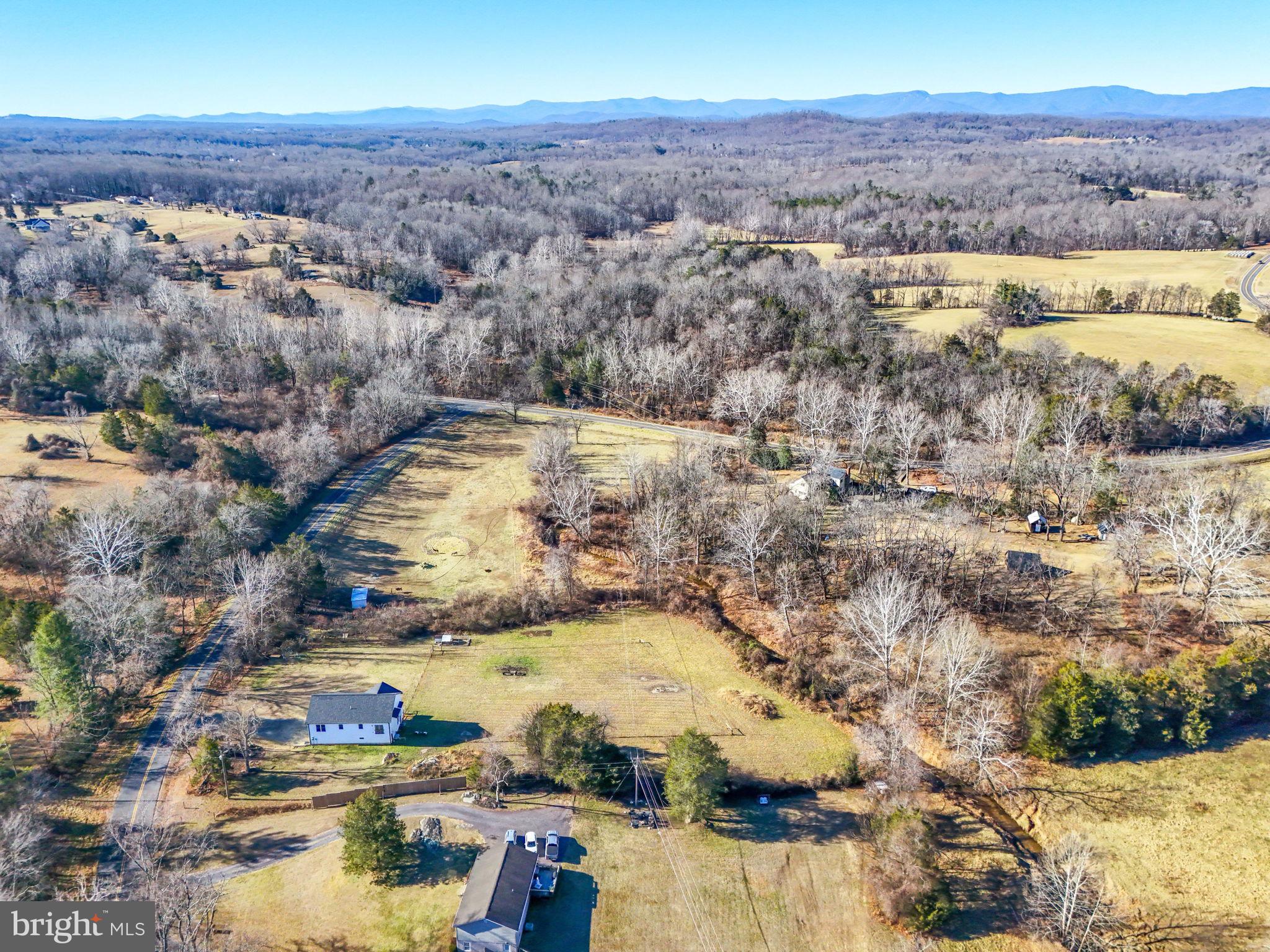 11183 Drogheda Mountain Road Culpeper, VA 22701 - Photo 45 of 60 an aerial view of residential houses with outdoor space