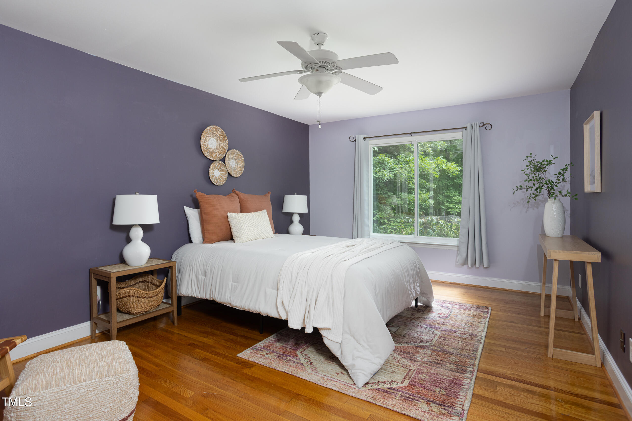 404 Denton Street Durham, NC 27713 - Photo 14 of 44 a bedroom with a bed and window