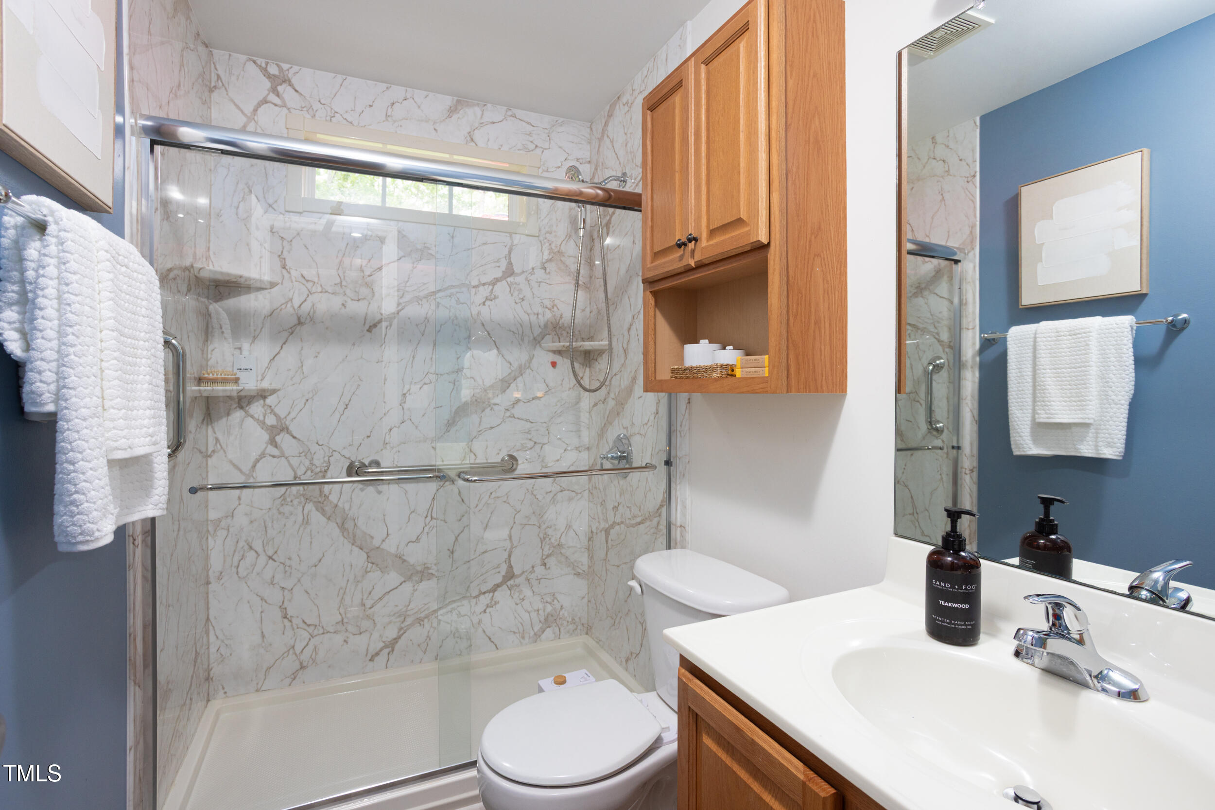 404 Denton Street Durham, NC 27713 - Photo 29 of 44 a bathroom with a sink vanity granite toilet and shower