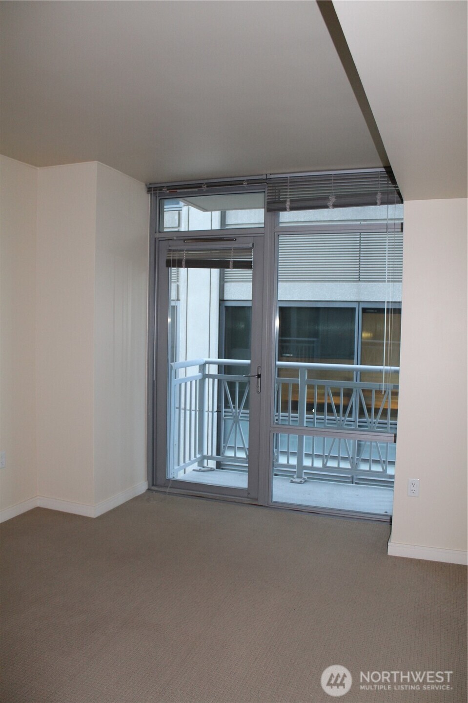 819 Virginia Street, Unit 2808 Seattle, WA 98101 - Photo 13 of 34 a view of an empty room with a window