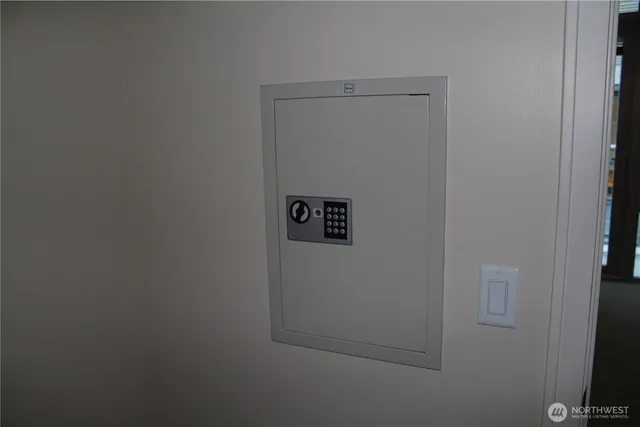 a bathroom with a sink toilet and a mirror