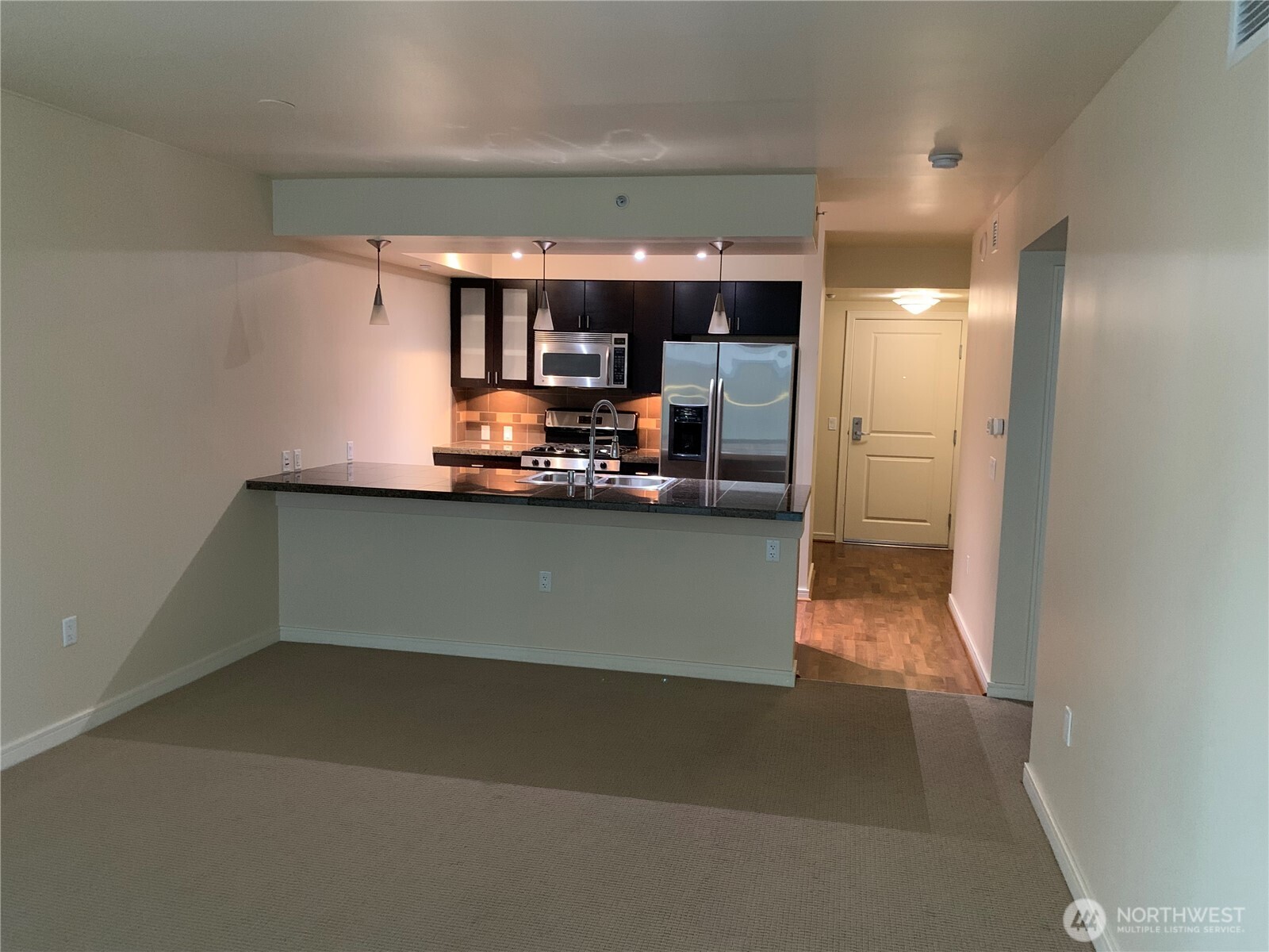 819 Virginia Street, Unit 2808 Seattle, WA 98101 - Photo 7 of 34 a view of kitchen and sink