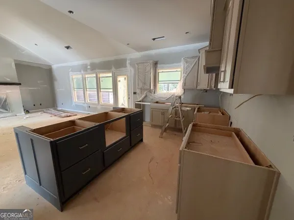 a room with white cabinets