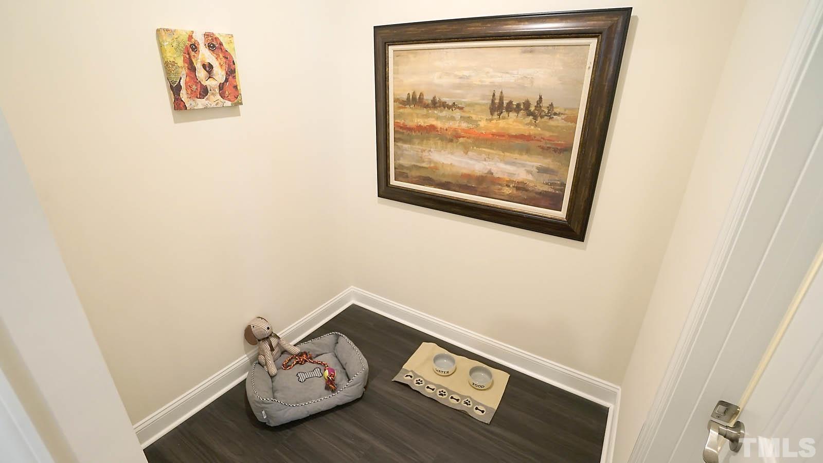 620 Trocha Drive Cary, NC 27513 - Photo 22 of 44 a view of room with painting on the wall