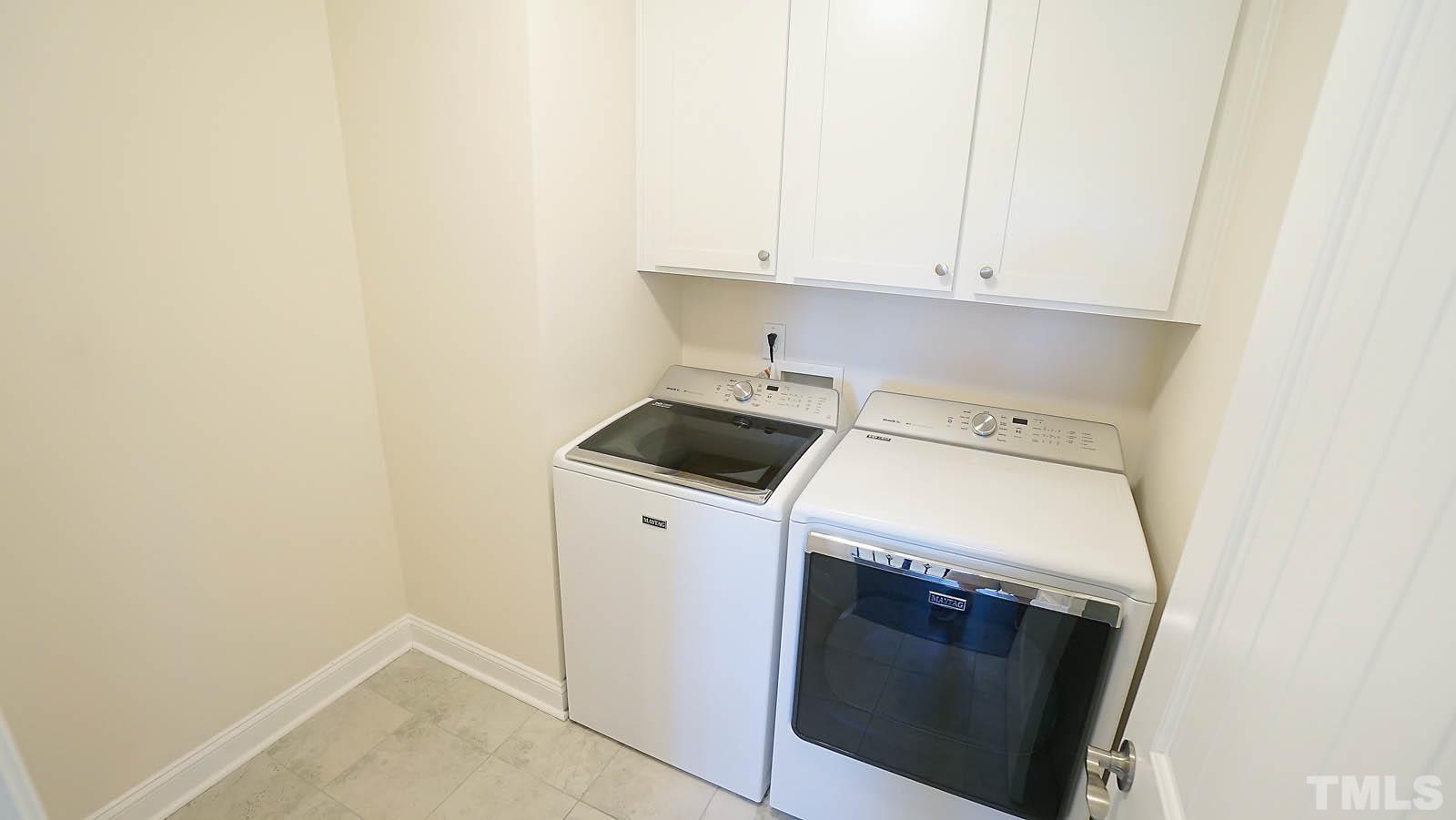 620 Trocha Drive Cary, NC 27513 - Photo 42 of 44 a utility room with dryer and washer