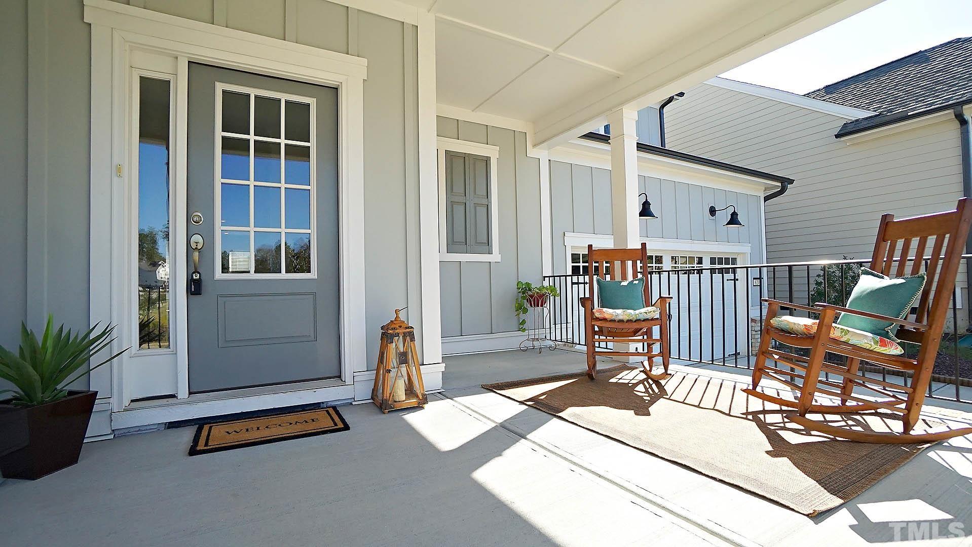 620 Trocha Drive Cary, NC 27513 - Photo 5 of 44 a living room with furniture and a potted plant