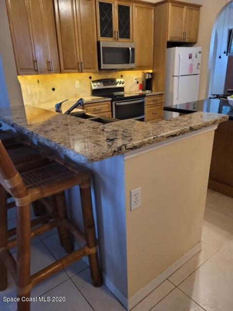 736 Carriage Hill Road Melbourne, FL 32940 - Photo 5 of 16 Breakfast Bar