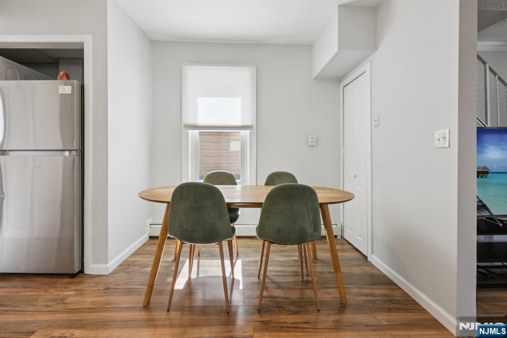 22 Treptow Street Little Ferry, NJ 07643 - Photo 12 of 44 a living room with furniture and a window