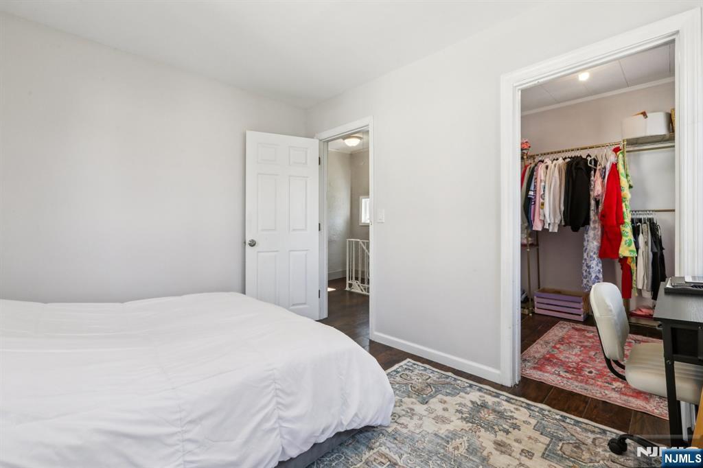 22 Treptow Street Little Ferry, NJ 07643 - Photo 24 of 44 a bedroom with a bed and a window