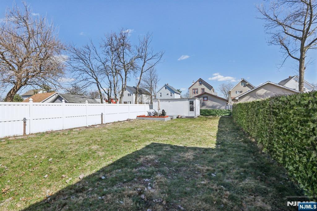 22 Treptow Street Little Ferry, NJ 07643 - Photo 34 of 44 a view of yard with tree in front of it