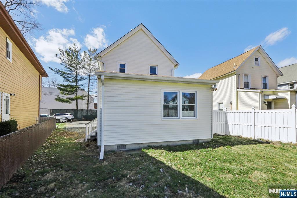 22 Treptow Street Little Ferry, NJ 07643 - Photo 35 of 44 a view of a yard in front view of a house