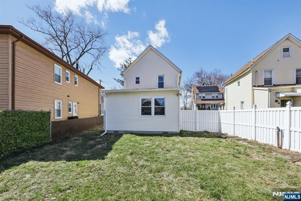 22 Treptow Street Little Ferry, NJ 07643 - Photo 36 of 44 a view of a house with a yard