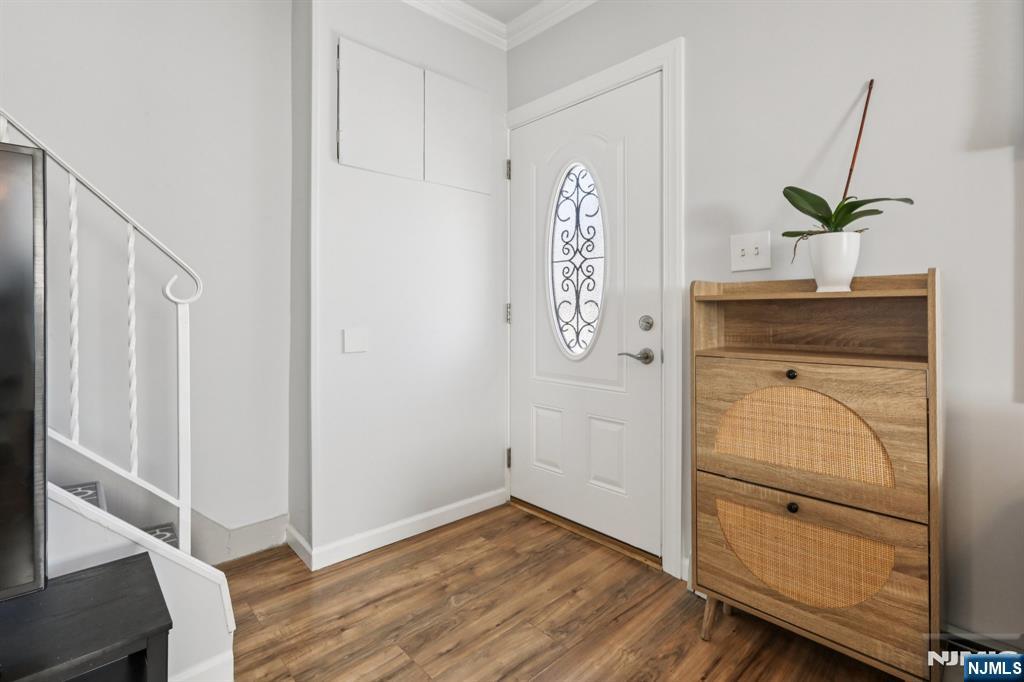 22 Treptow Street Little Ferry, NJ 07643 - Photo 6 of 44 a view of an entryway with wooden floor