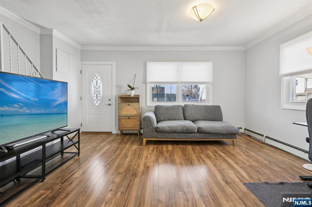 22 Treptow Street Little Ferry, NJ 07643 - Photo 10 of 44 a living room with furniture and wooden floor