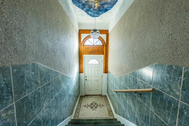 a bathroom with a sink and mirror
