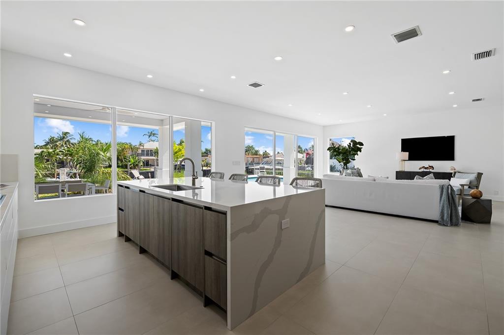 3204 Dover Road Pompano Beach, FL 33062 - Photo 20 of 73 Kitchen Overlooks The Great Room