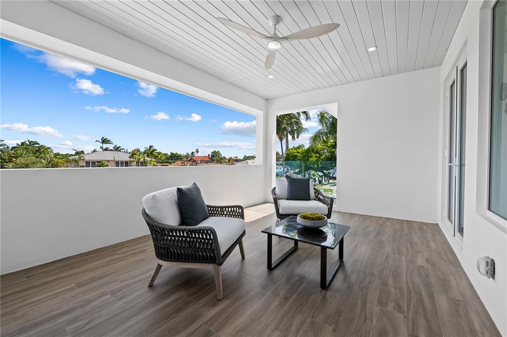 3204 Dover Road Pompano Beach, FL 33062 - Photo 42 of 73 a living room with furniture and a window